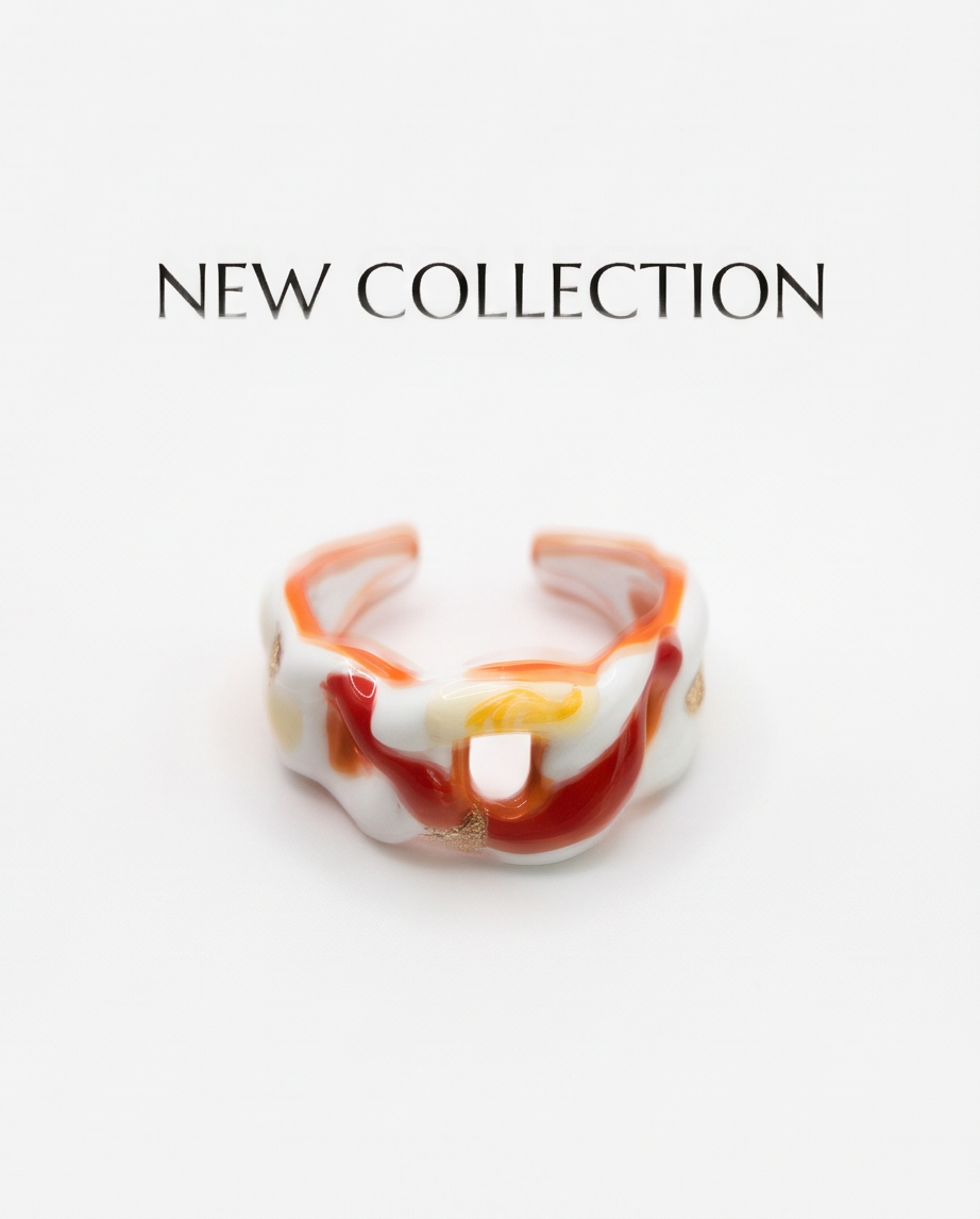 Red and orange ceramic ring with gold flakes