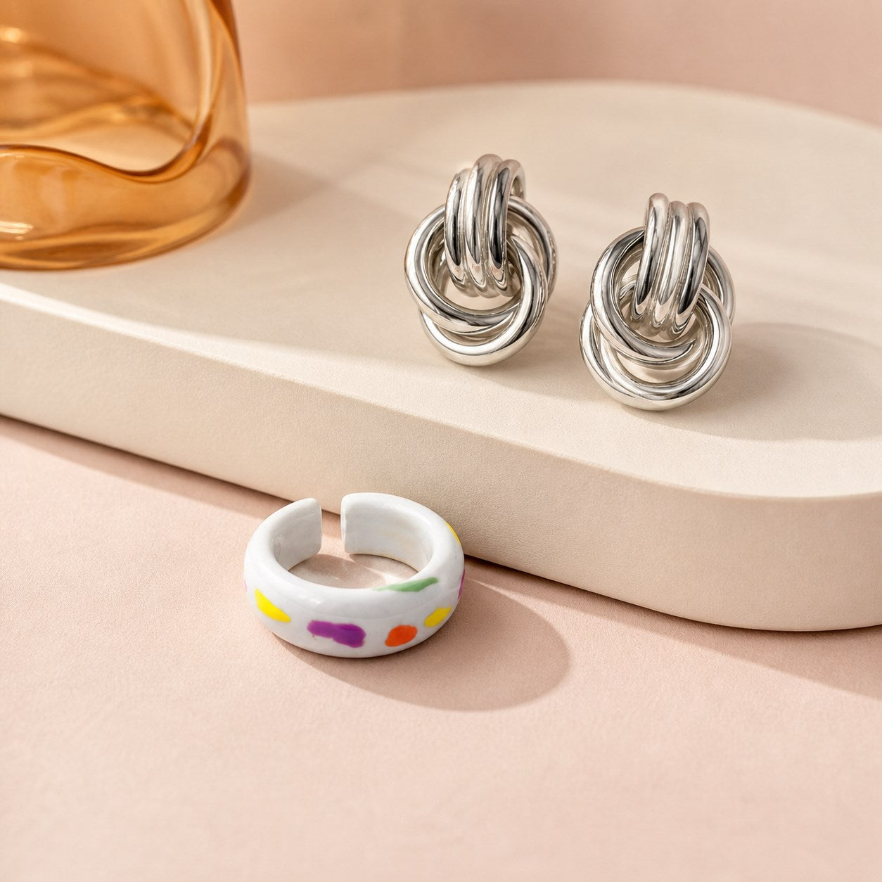Contemporary fashion jewelry in warm neutral tones