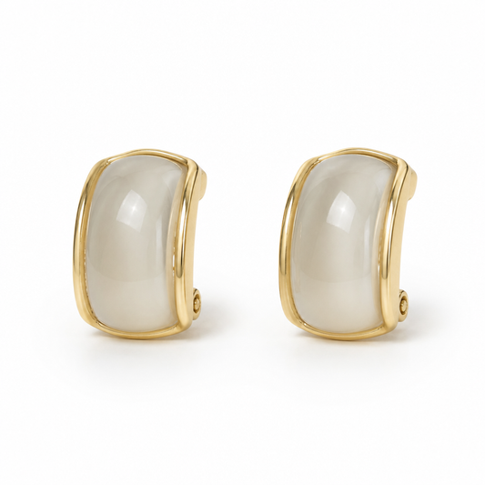 Curved yellow trimmed pearl earrings