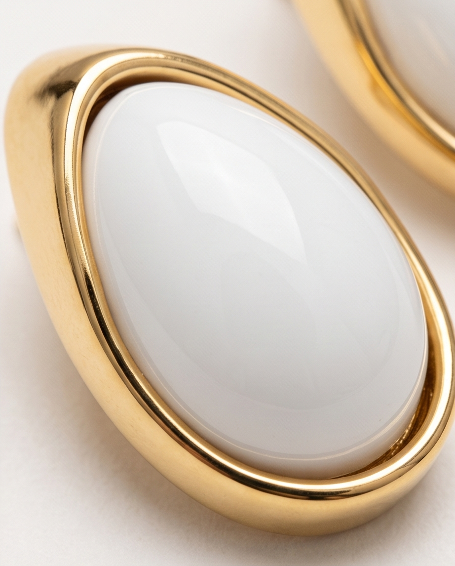 Gold-Framed White Teardrop Stud Earrings